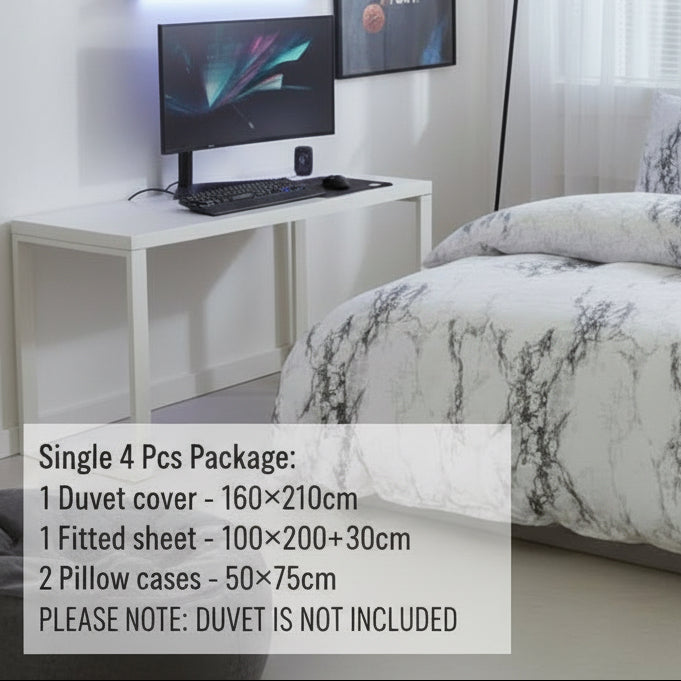 Marble-patterned bedding set on a bed in a room with a desk and decor. Unite Arab Emirates, Abu Dhabi, Dubai