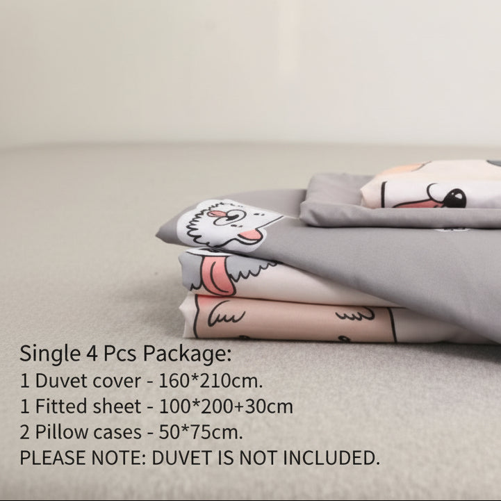 Stack of gray bedding with cartoon designs on a light gray surface.