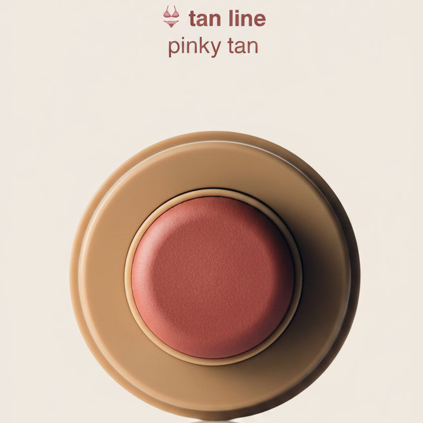 Cosmetic compact with pink blush on a white background