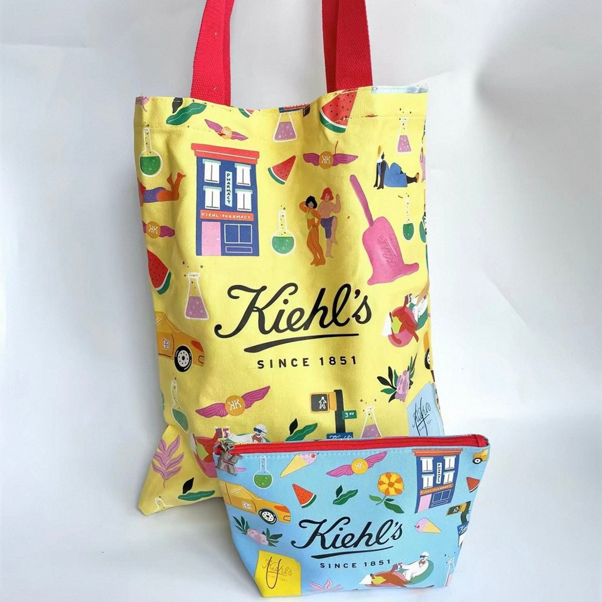 Kiehl's yellow character pattern canvas bag with cosmetic bag