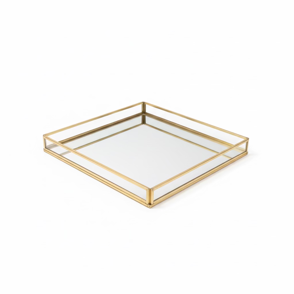 Decorative glass tray on a table with a vase and elephant figurine in the background