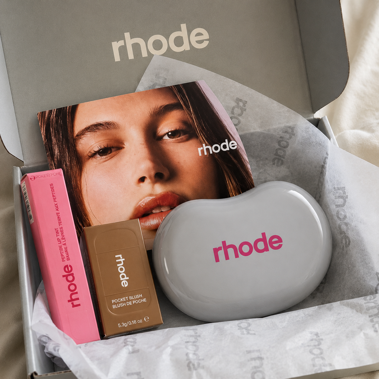 Rhode Jellybean Birthday Duo! Blush Raspberry -Teacup, Peptide Lip Gloss Jelly Bean and cosmetic bag Grey