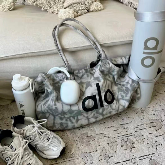 Alo Trendy Shopper Tote in a grey tie-dye pattern - BusDeals