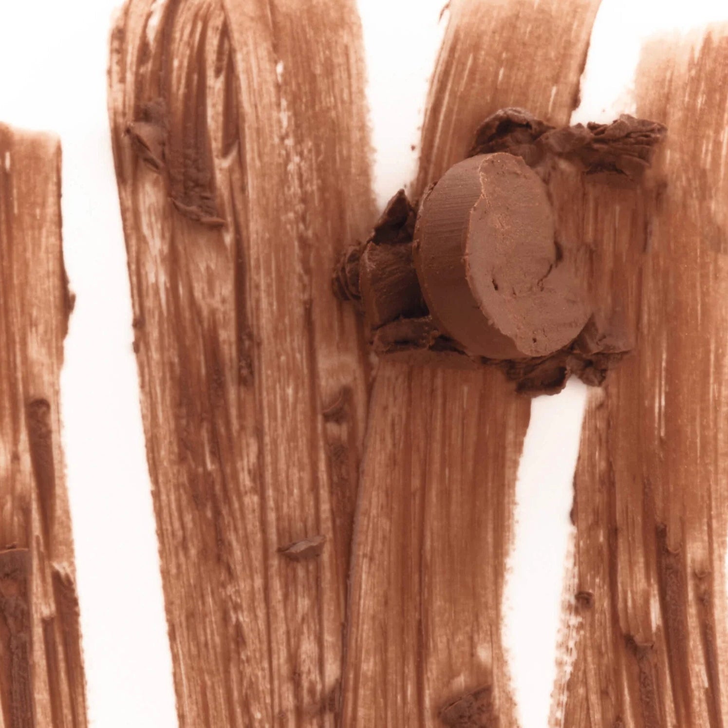 Close-up of wooden logs with a focus on texture and grain.