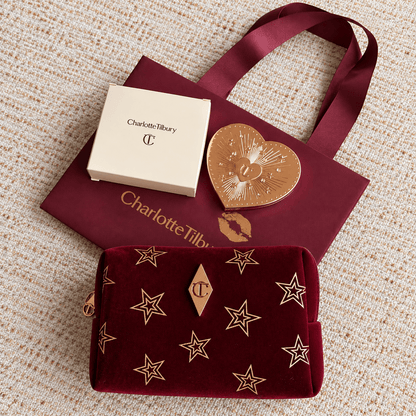 Charlotte Tilbury Star Icon Velvet Pouch with Heart Shape makeup mirror in a shopping bag - BusDeals