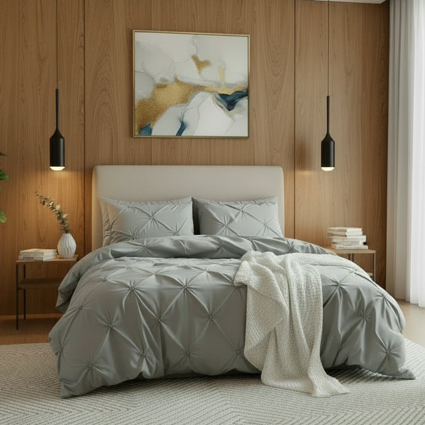 Modern bedroom with a bed, nightstands, and wall art.