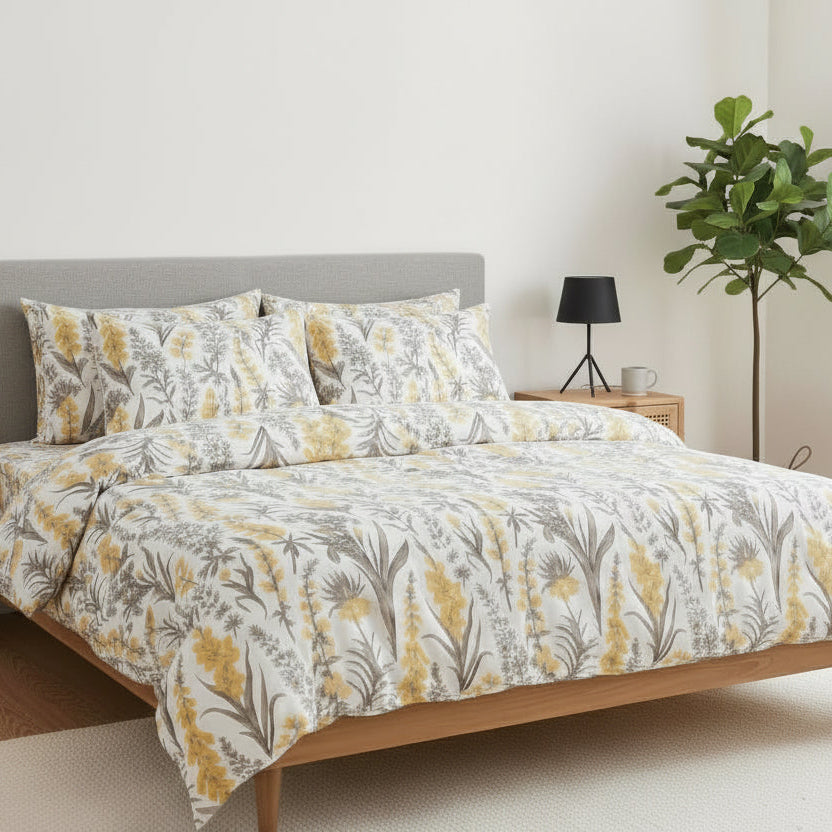 Bedroom with floral bedding on a wooden bed frame, nightstands, and lamps. Bed with floral bedding in a bright bedroom setting United Arab Emirates, Dubai UAE