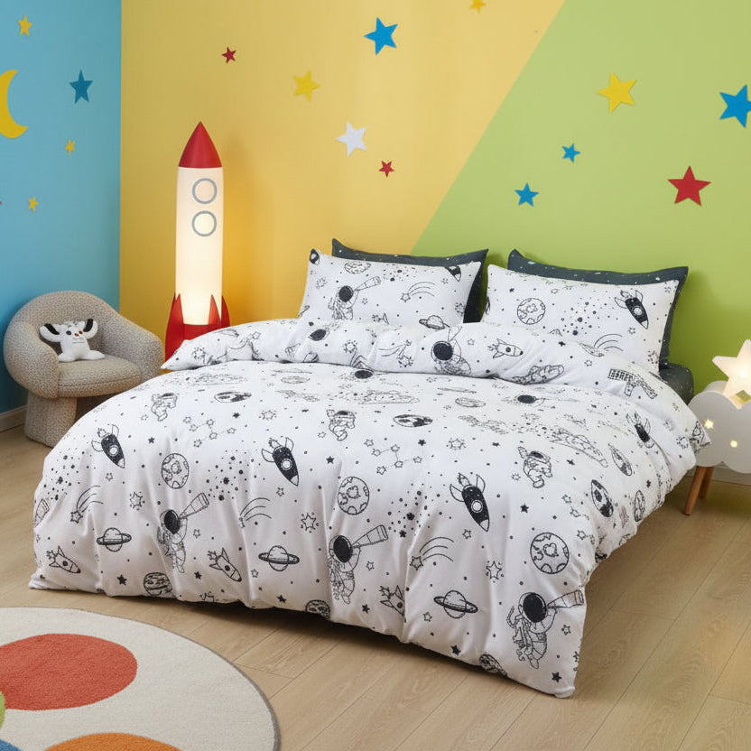 Children's bedroom with space-themed bedding and colorful wall decorations.