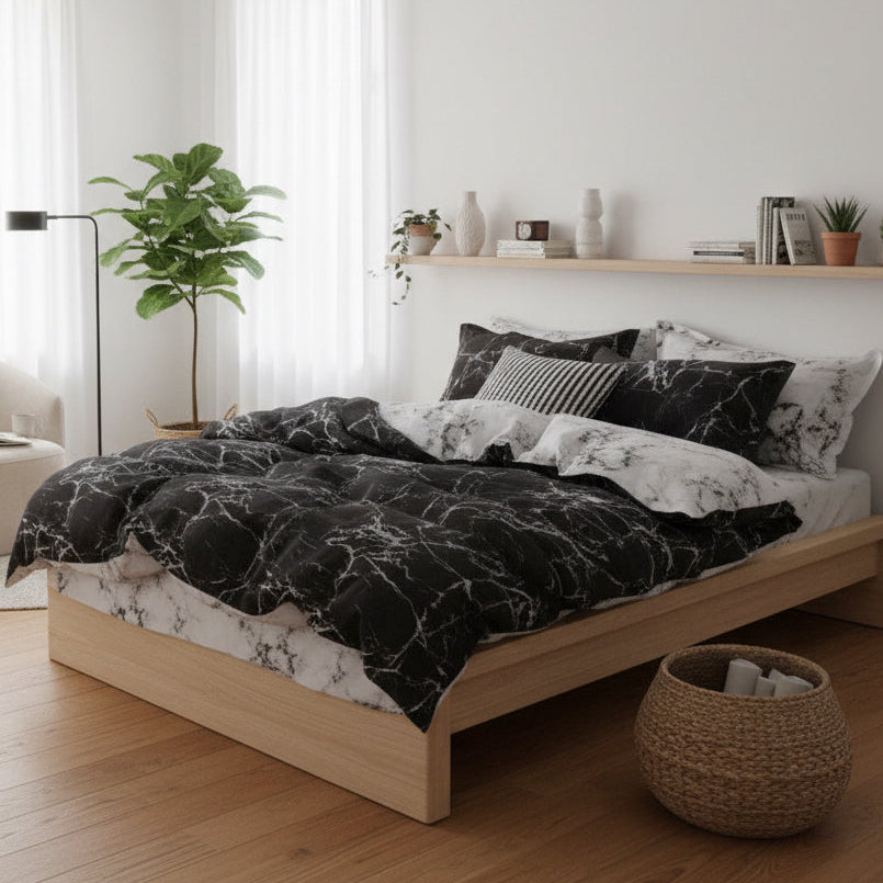 Modern bedroom with marble-patterned bedding, shelves, and decorative items.